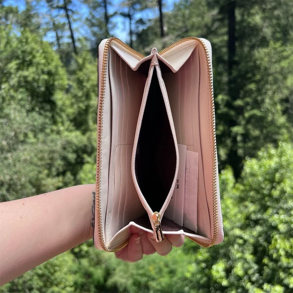 Coach accordion zip